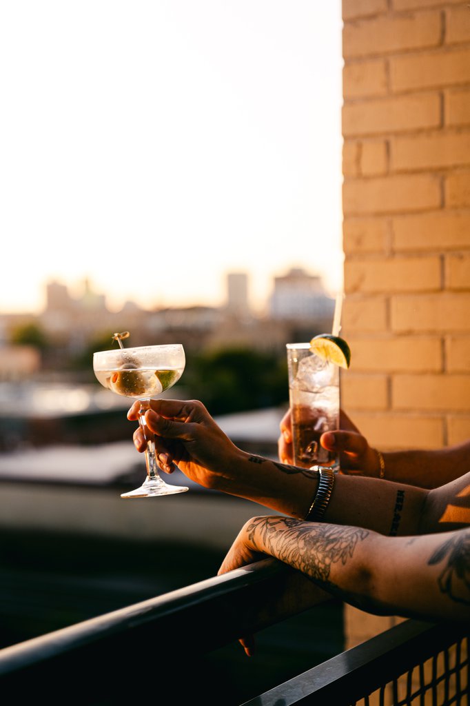 two drinks at selva chicago patio looking over fulton market city view