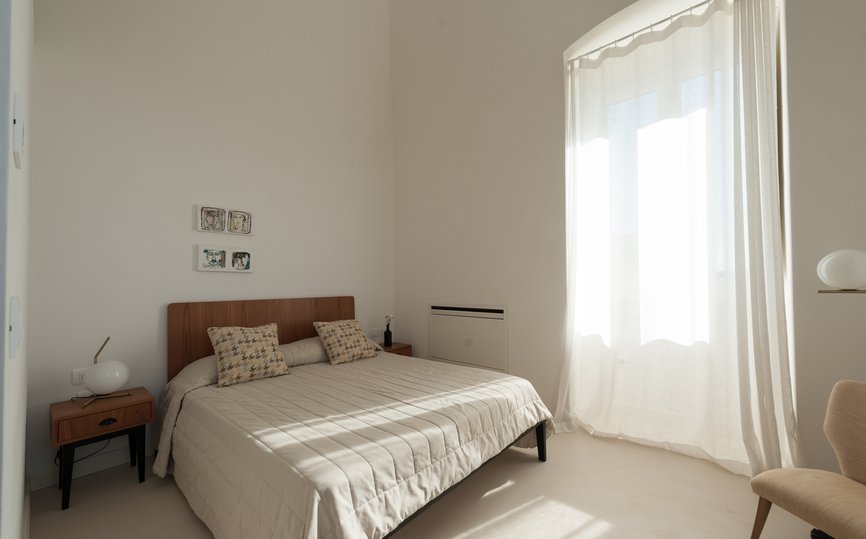 bedroom with king bed in superior suite at Villa Torre Bianca by Emily Hotels in Puglia Italy