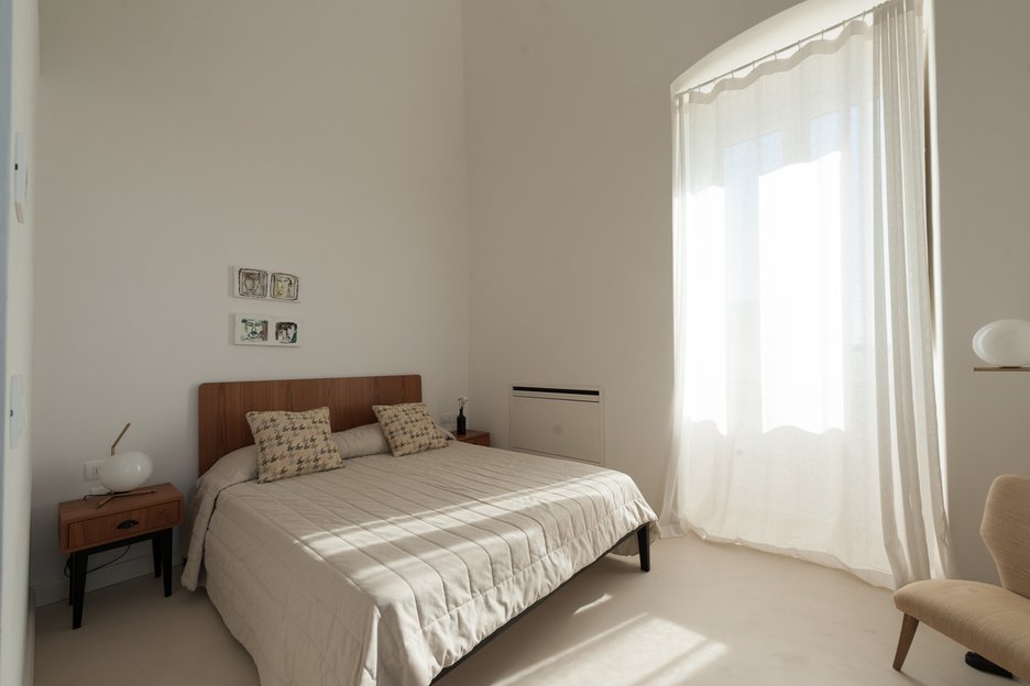 bedroom with king bed in superior suite at Villa Torre Bianca by Emily Hotels in Puglia Italy