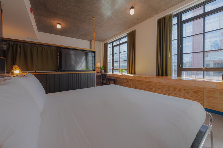 King Size Bed in the Loft Suite at The Emily Hotel