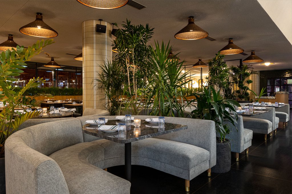 booth seating in the dining area at fora in the emily hotel