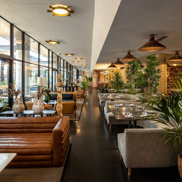 leather seats and booths at fora at the emily hotel