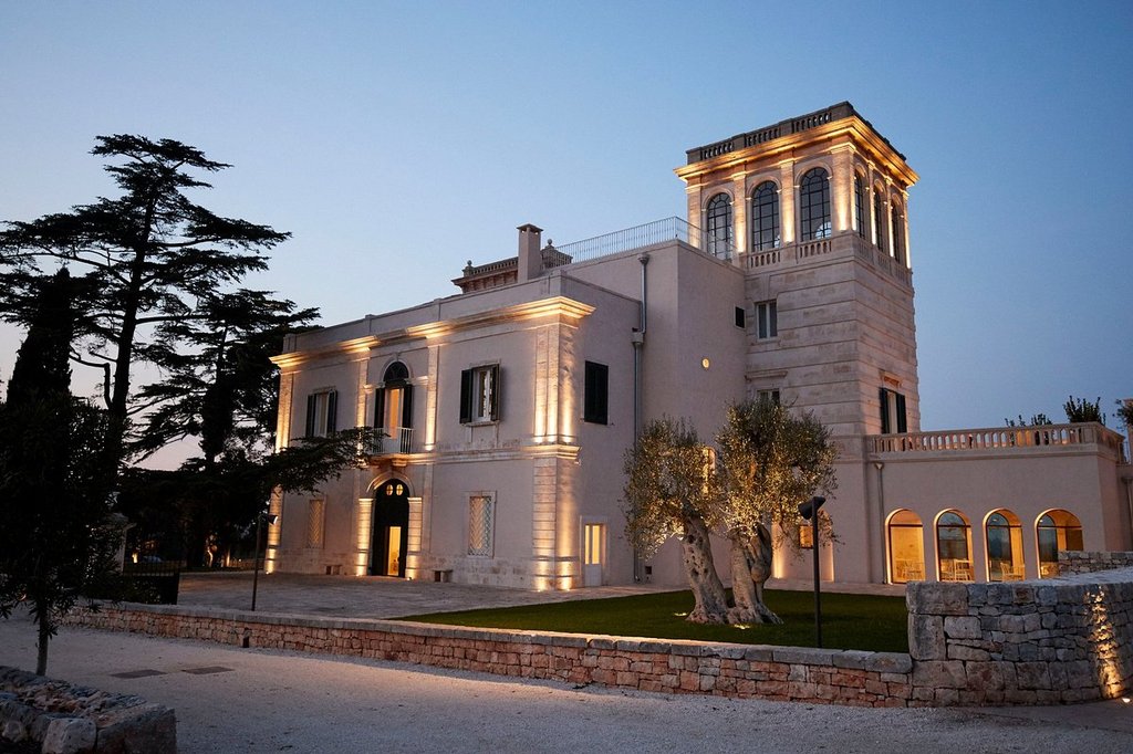 exterior of villa torre bianca at night puglia region