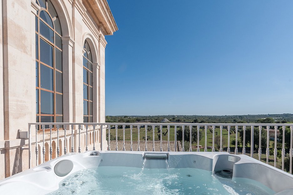 hot tub on the patio of torre bianca suite at villa torre bianca by emily hotels in puglia italy