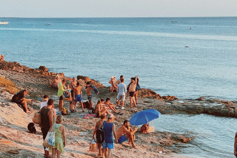 People on beach in Puglia