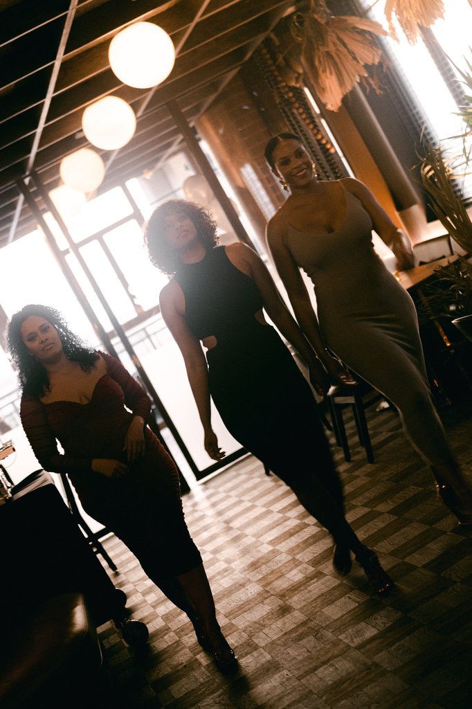 three woman walking at selva chicago ready to celebrate at the emily hotel fulton market